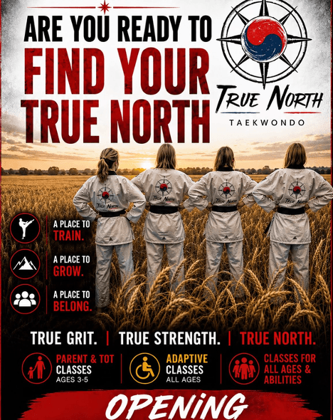 Four instructors standing in a wheat field.